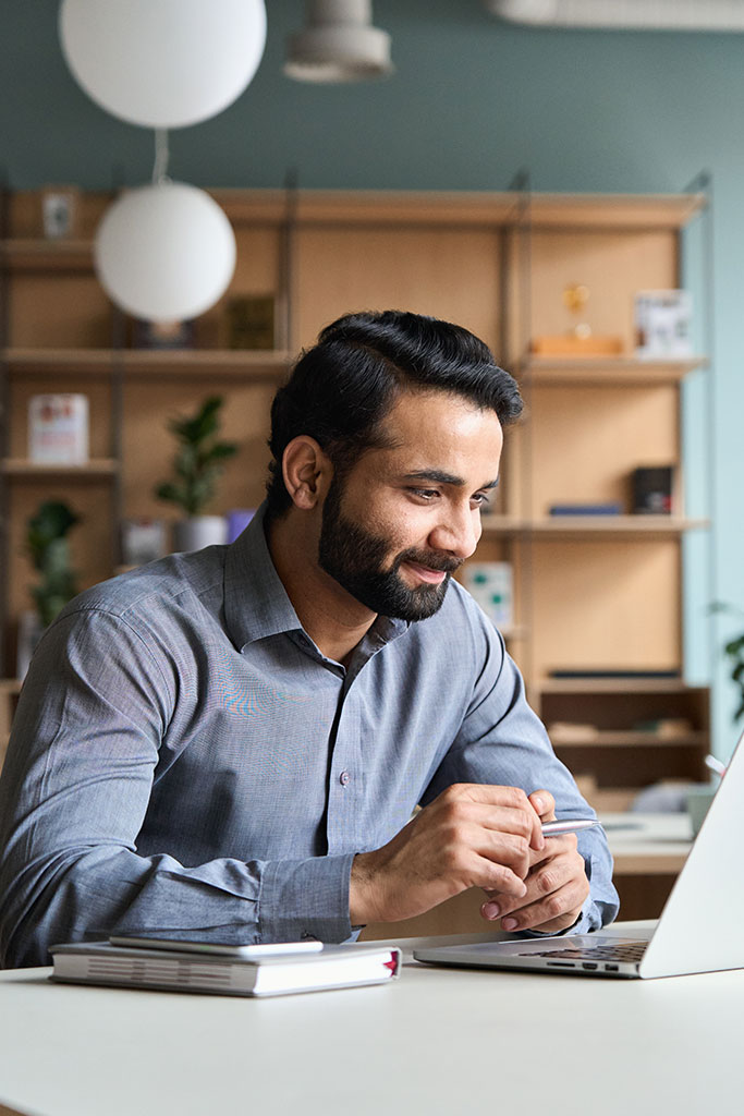 indian man using computer